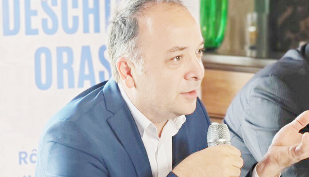JUNK-ul bate la ușă!? Noua Lege a salarizării riscă să arunce România într-un haos fiscal: Majorări  de miliarde fără sursă clară de finanțare